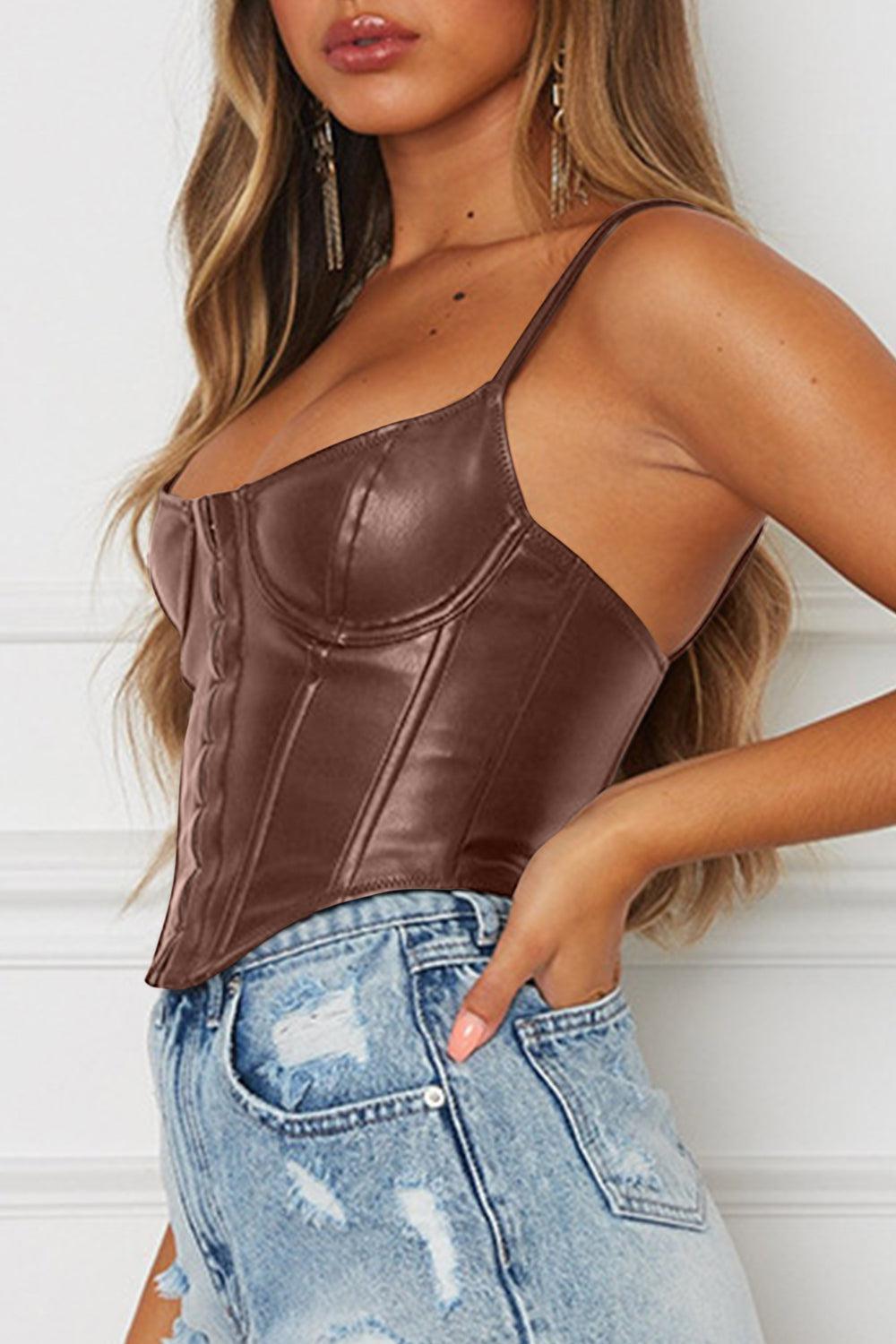 a woman wearing a brown leather corset