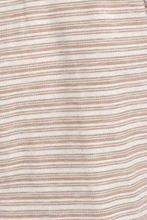 a close up of a white and brown striped shirt