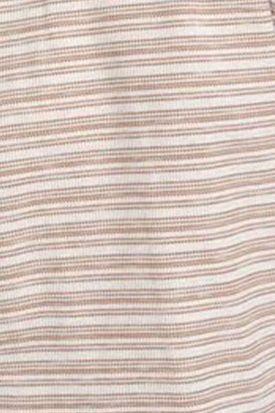 a close up of a white and brown striped shirt