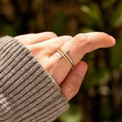 a woman's hand with a ring on it