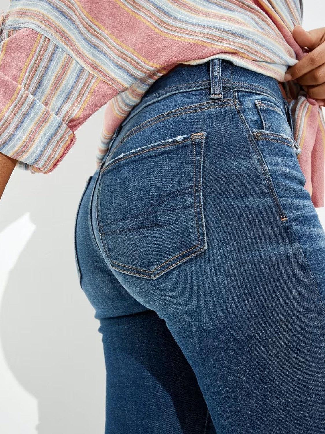 a close up of a person wearing jeans