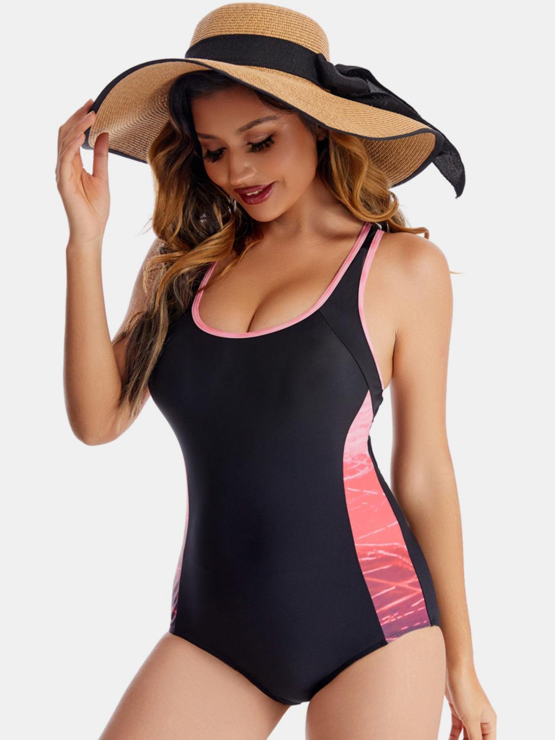 a woman wearing a swimsuit and hat