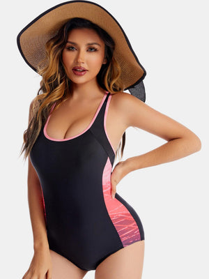 a woman wearing a swimsuit and a hat