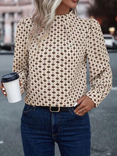 a woman standing on a street holding a cup of coffee