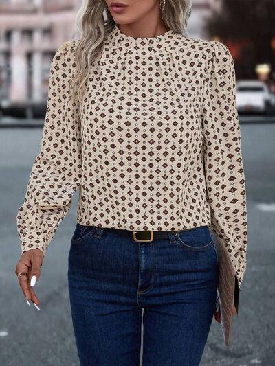 a woman with blonde hair wearing a white blouse and jeans