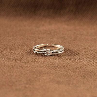 a close up of a ring on a brown cloth