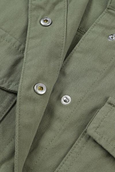 a close up of a green jacket with buttons