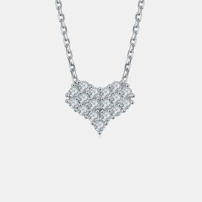 a diamond heart necklace on a chain