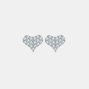 a pair of heart shaped diamond earrings