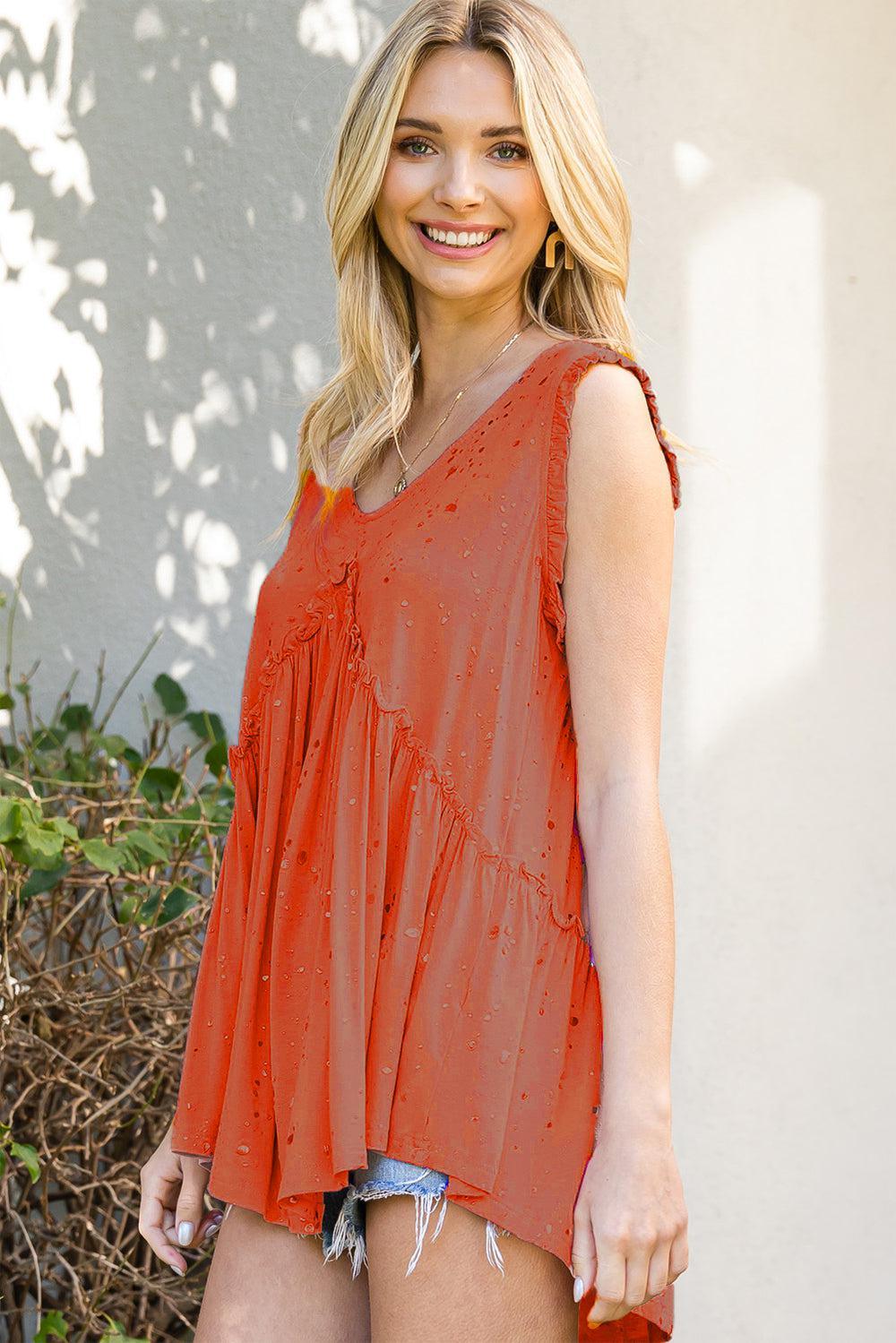 a woman in a red top posing for a picture