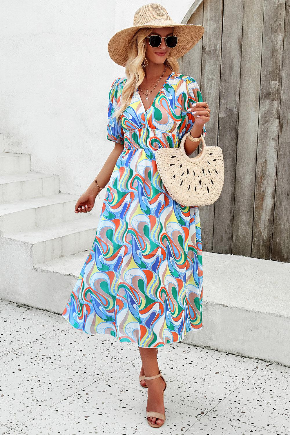 a woman wearing a colorful dress and hat