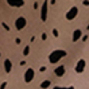 a black and white spotted animal print fabric