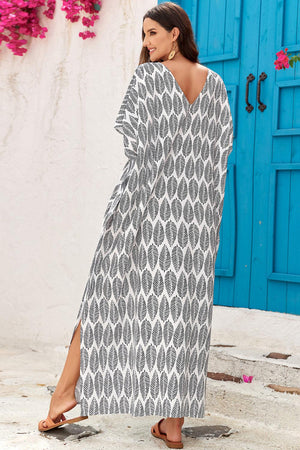 a woman standing in front of a blue door