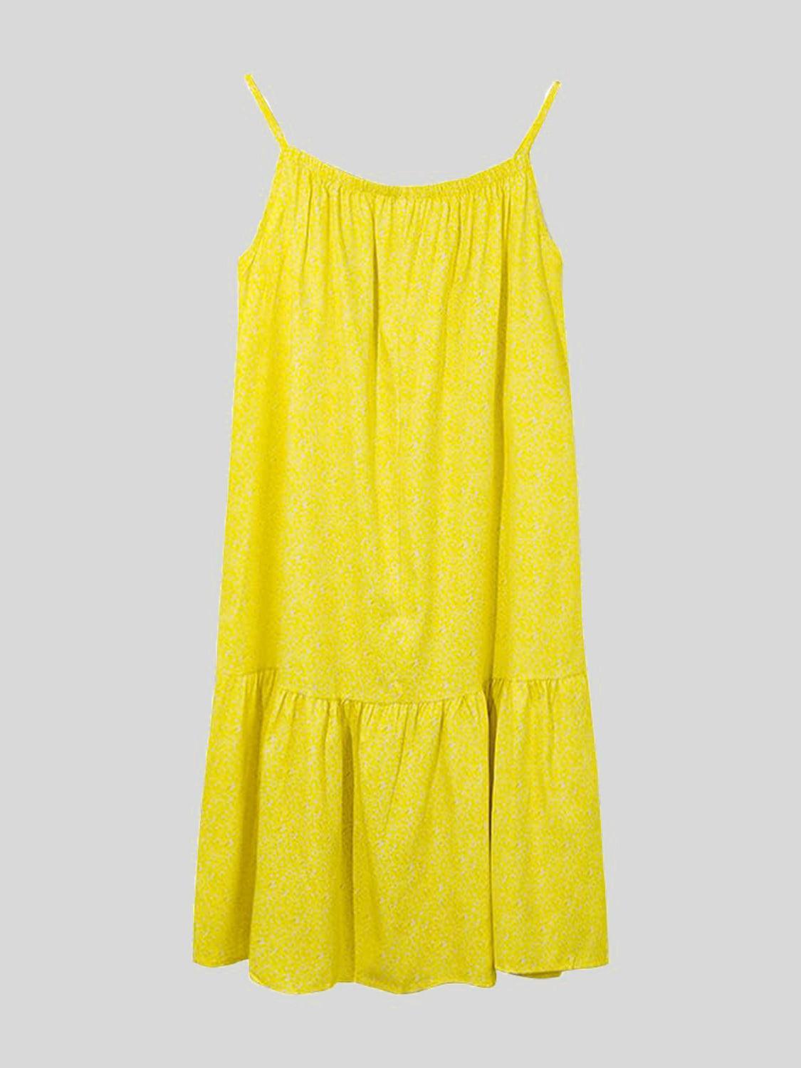 a yellow dress hanging on a hanger