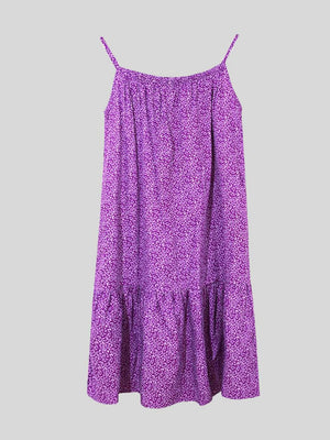 a purple dress with a floral pattern on it