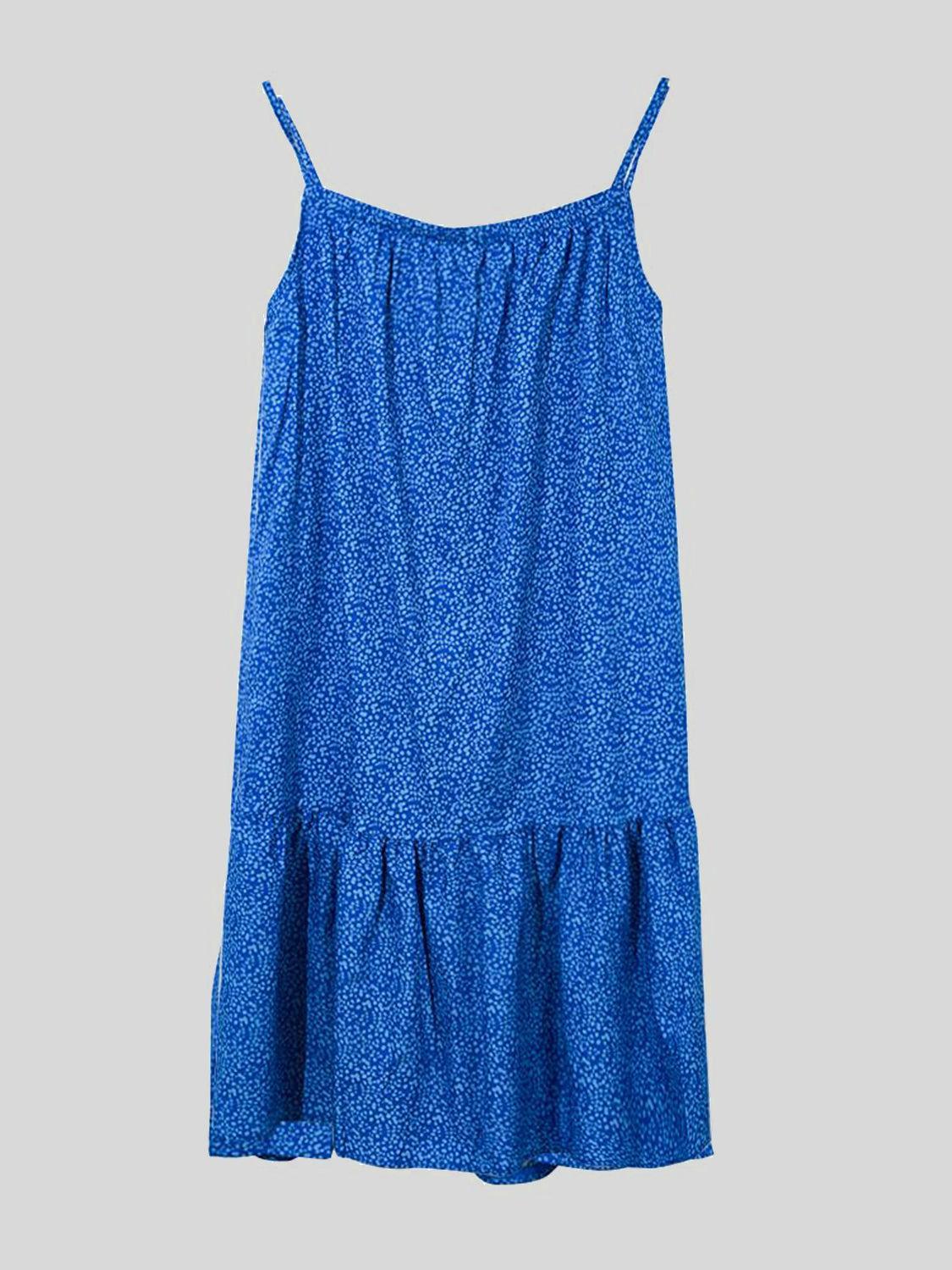 a blue dress with a ruffled hem