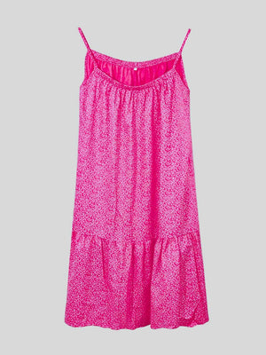 a pink dress with a flower pattern on it