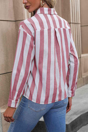 a woman wearing a red and white striped shirt