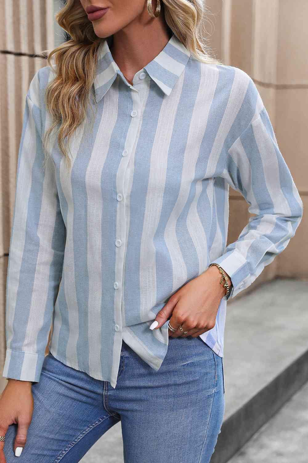 a woman wearing a blue and white striped shirt