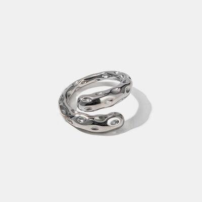 a pair of silver rings on a white background