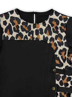 a black top with a leopard print on it