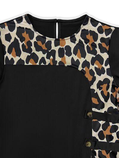a black top with a leopard print on it