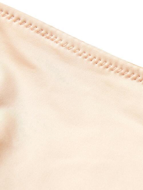 a close up of a white shirt with a zipper