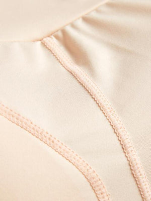 a close up of a white shirt with a zipper