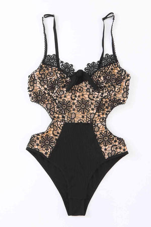 a women's black and beige lingerie