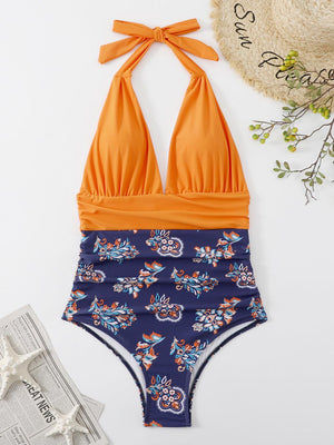 a swimsuit with an orange top and blue bottom