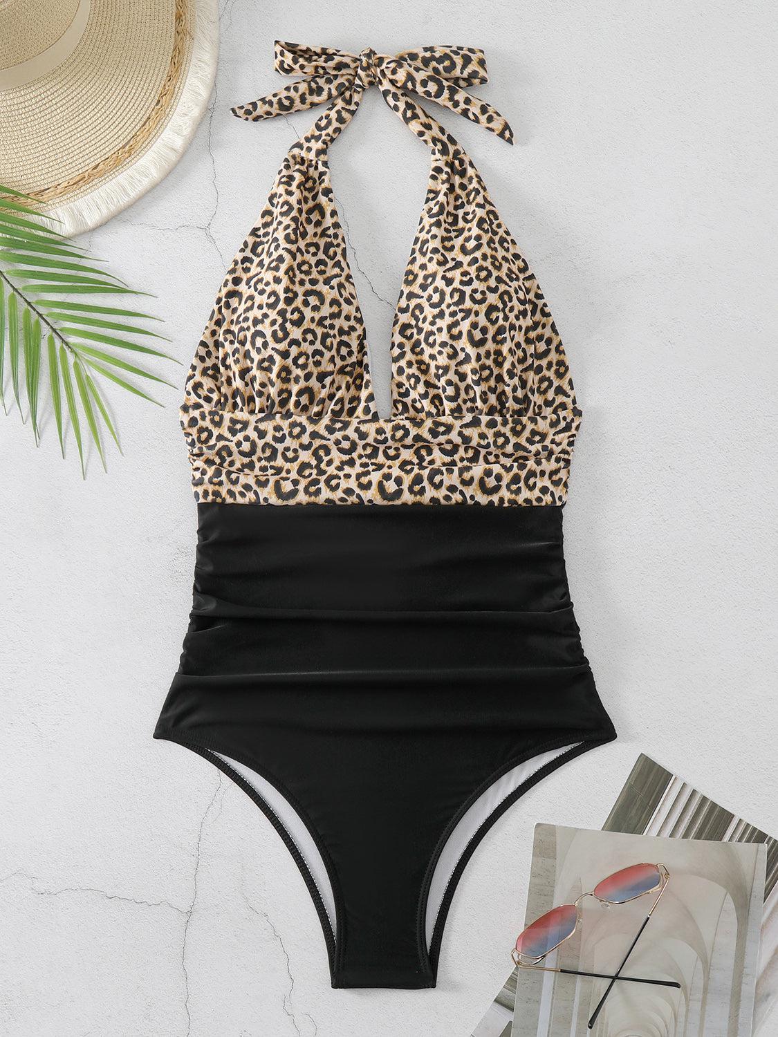 a bathing suit with a leopard print halter top