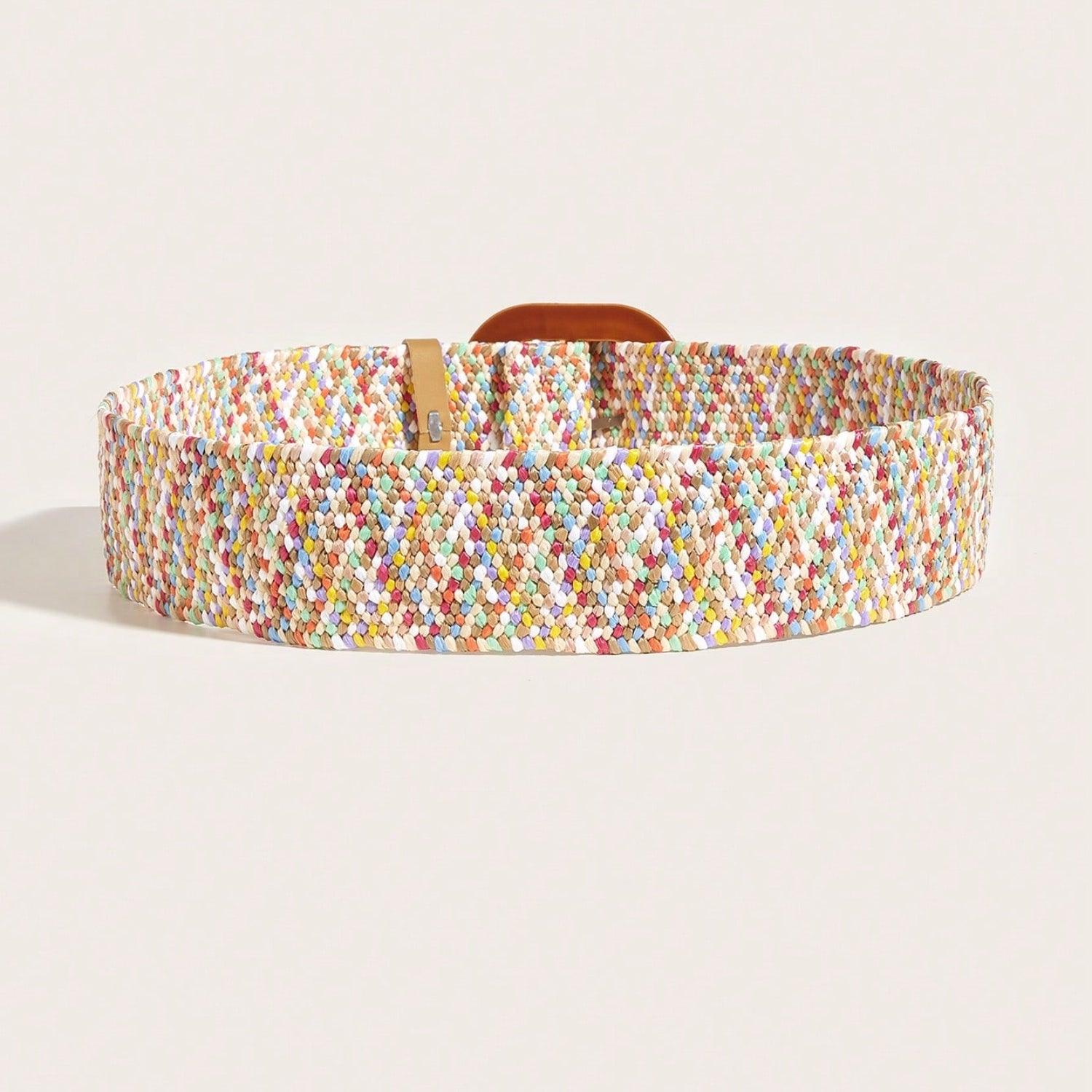 a white belt with multicolored dots on it