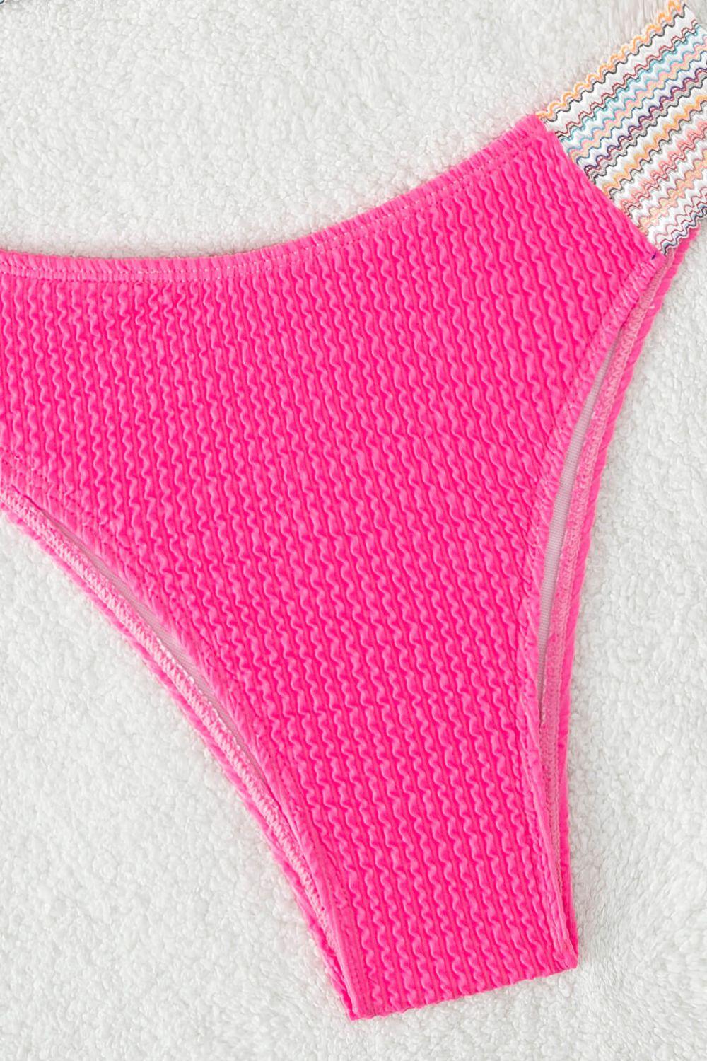 a close up of a pink bikini bottom