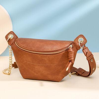 a brown leather purse sitting on top of a table