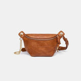 a brown leather fanny bag with a chain strap