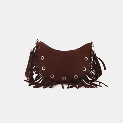 a brown handbag with fringes on it