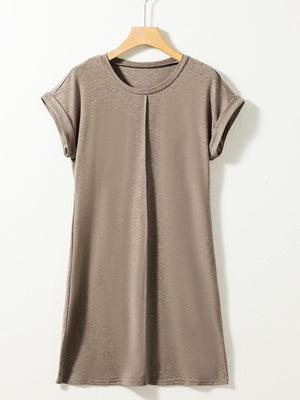 a women's t - shirt hanging on a hanger