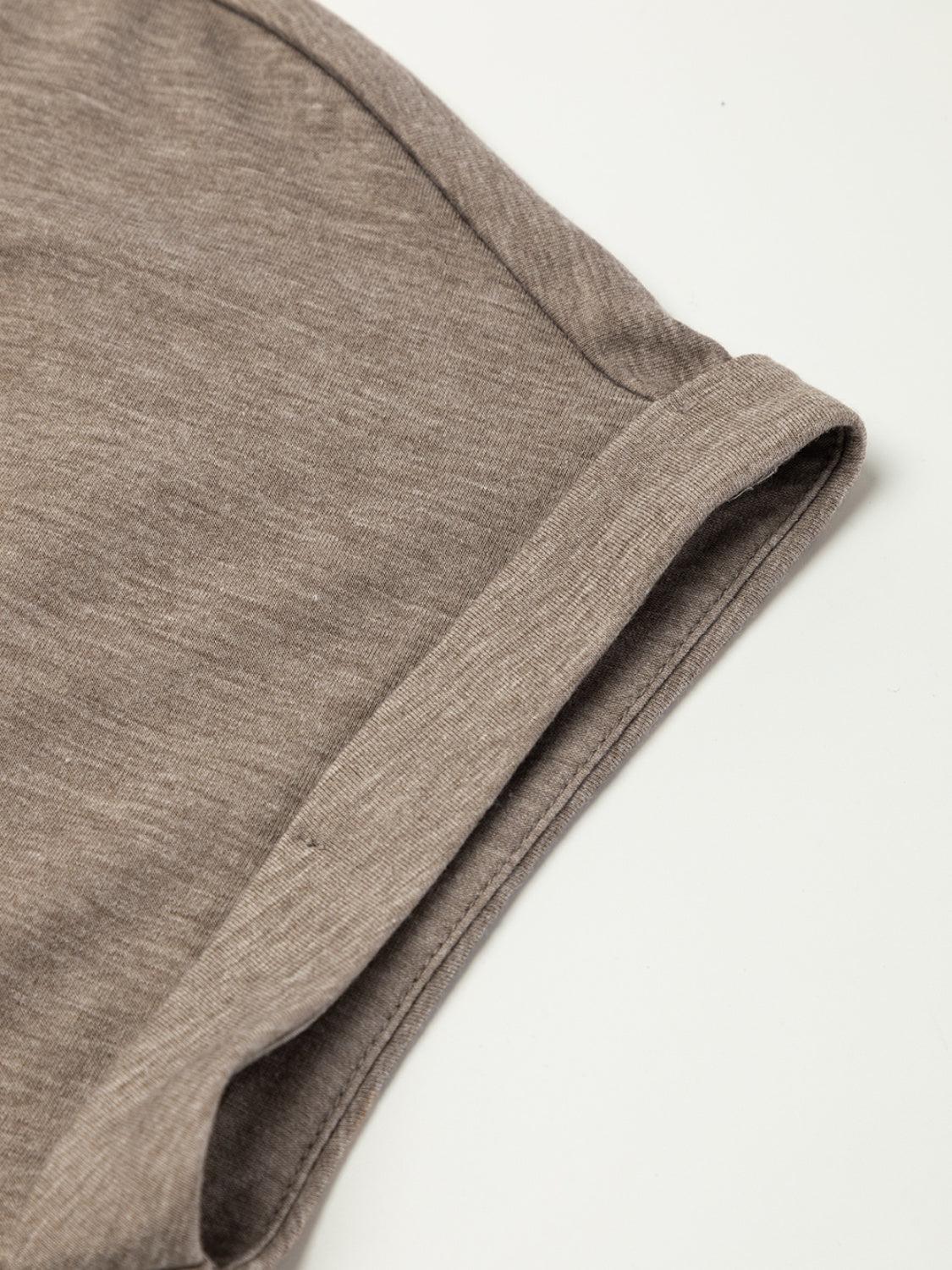 a close up of a shirt on a white surface