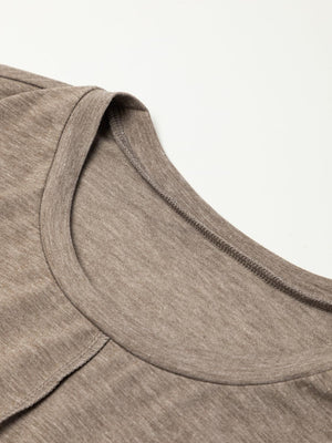 a close up of a t - shirt on a white surface