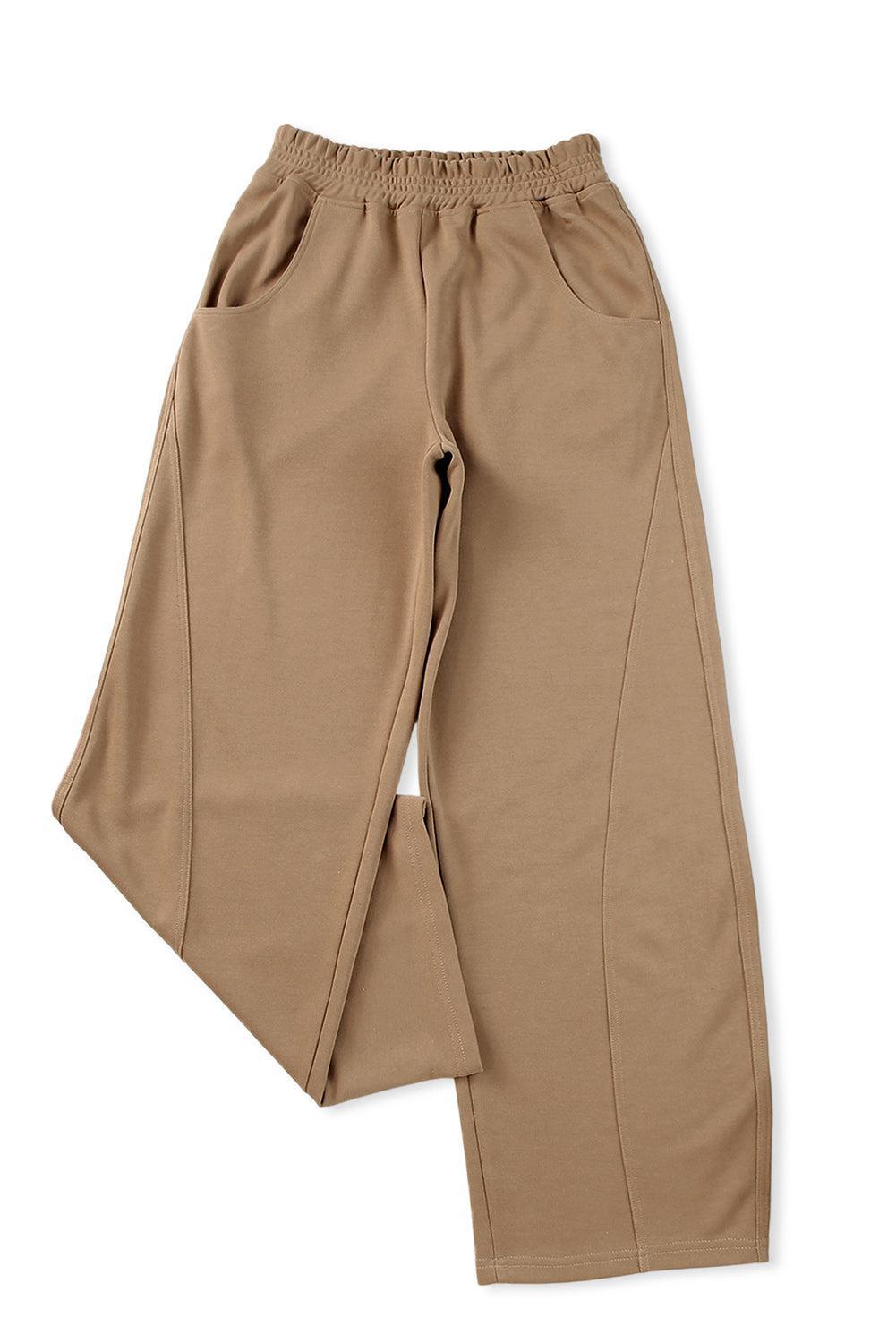 a pair of tan pants on a white background