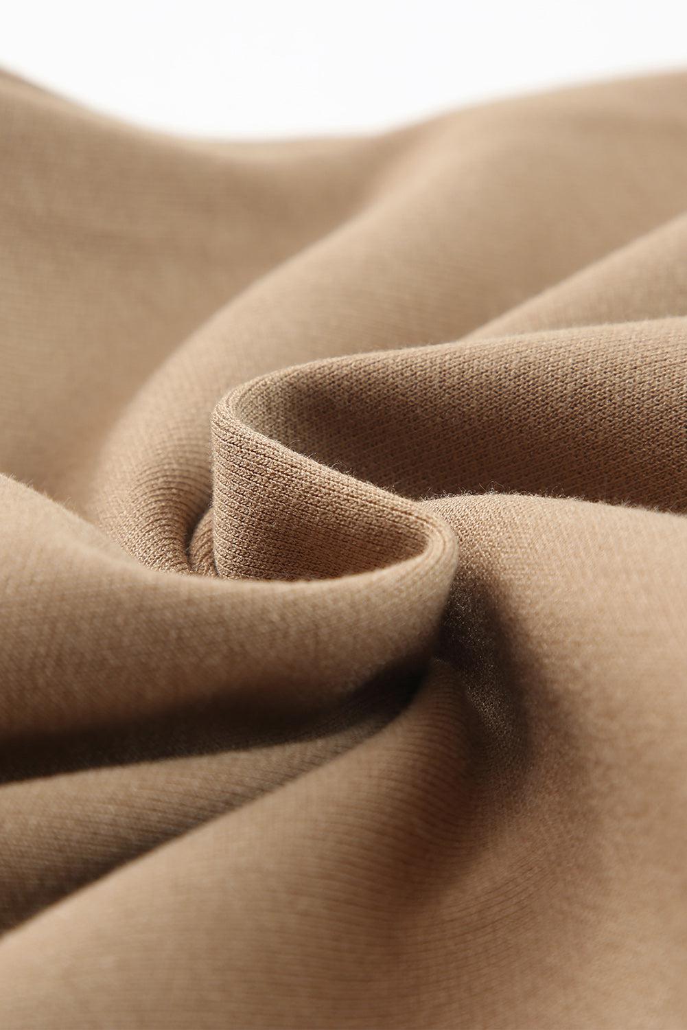 a close up view of a tan fabric