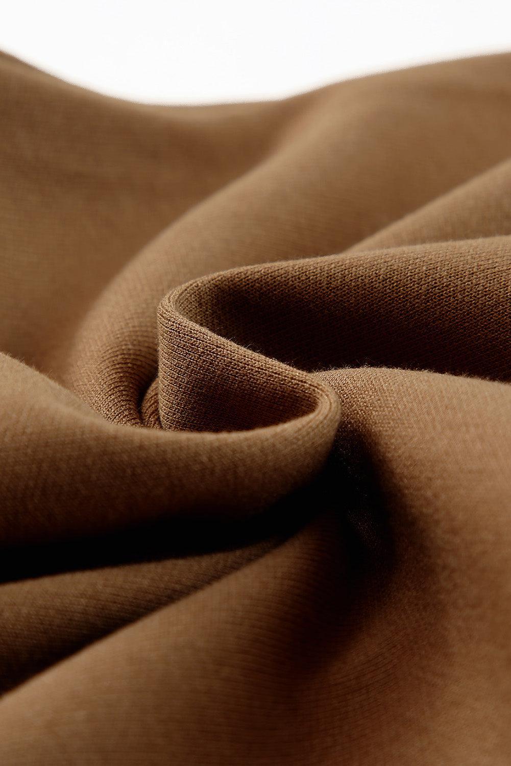 a close up of a brown fabric with a white background