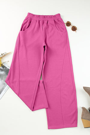 a pair of pink pants sitting on top of a table