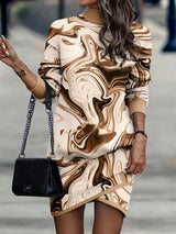 a woman is walking down the street with a handbag