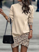 a woman in a leopard print skirt and turtle neck sweater