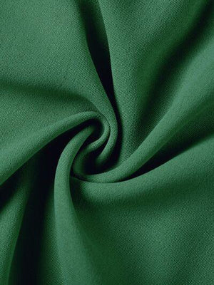 a close up view of a green fabric