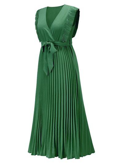 a green dress on a mannequin mannequin mannequin manne