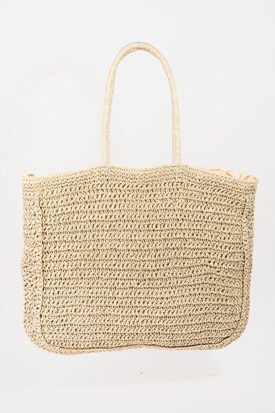 a straw bag on a white background