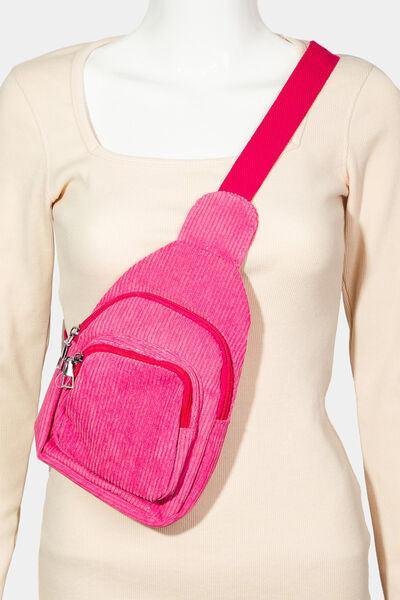 a pink fanny bag sitting on top of a mannequin