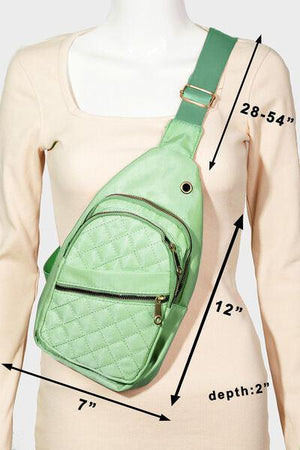 a woman is wearing a green fanny bag